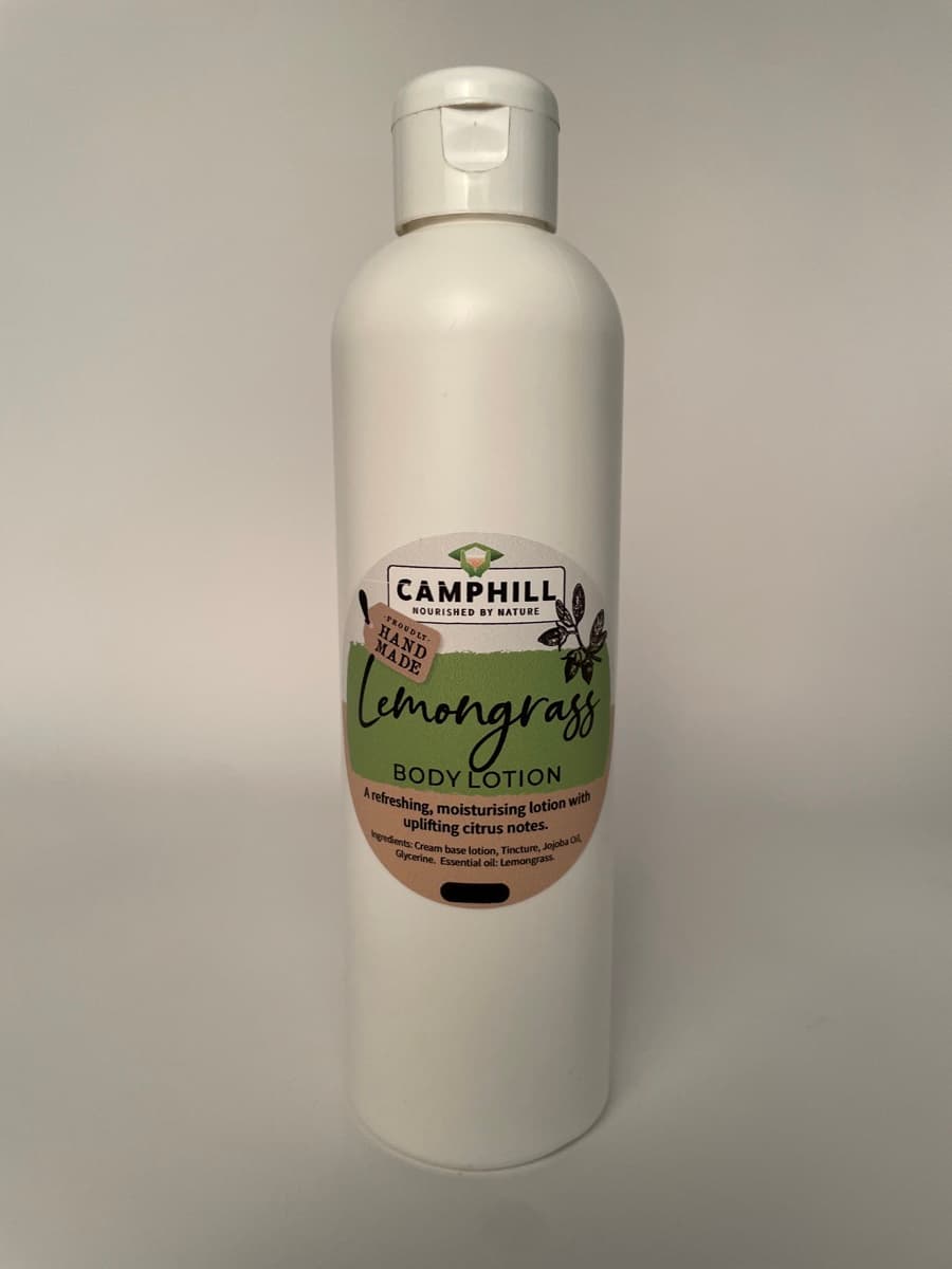 A 250ml white bottle of Camphill Lemongrass Body Lotion.